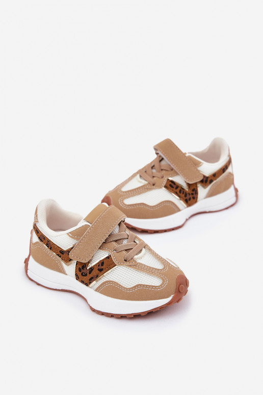 Chaussures modèle baskets Puéril avec attaches adhésives avec des motifs en fourrure de léopard beige Tezzu
