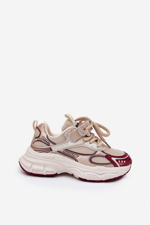 Chaussures modèle baskets Puéril Sur une semelle épaisse couleur dorée Xairana