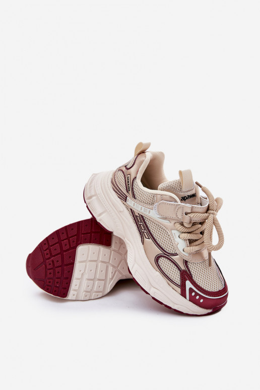 Chaussures modèle baskets Puéril Sur une semelle épaisse couleur dorée Xairana