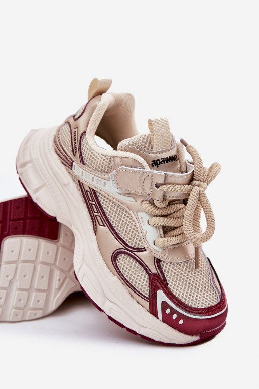 Chaussures modèle baskets Puéril Sur une semelle épaisse couleur dorée Xairana