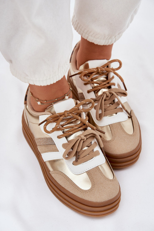 Sneakers model schoenen Dames met platform Z PodInójnym Vetersluitingm met luipaardbontpatronen gouden kleur Niteria