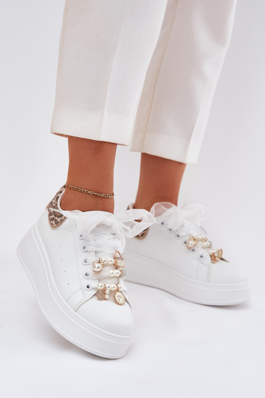 Chaussures modèle baskets Féminin avec une plateforme Z Przypinkami couleur blanche avec des motifs en fourrure de léopard Ocerd