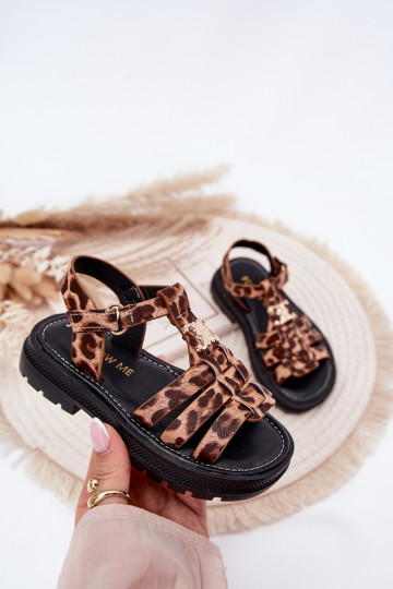 Sandales pour enfants avec détails décoratifs et motifs léopard