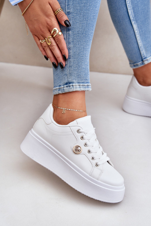 Eko Peau Chaussures modèle baskets avec une plateforme Ze couleur doréem Detalem couleur blanche Zingie