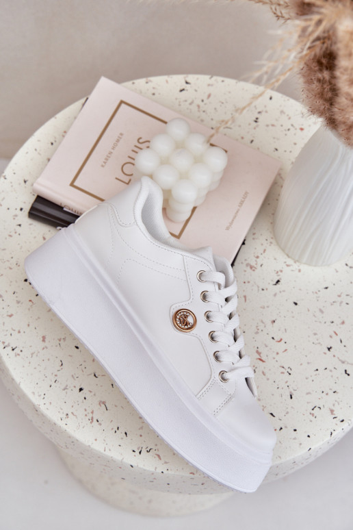 Eko Peau Chaussures modèle baskets avec une plateforme Ze couleur doréem Detalem couleur blanche Zingie
