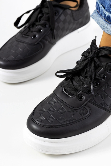 Baskets noires sur...