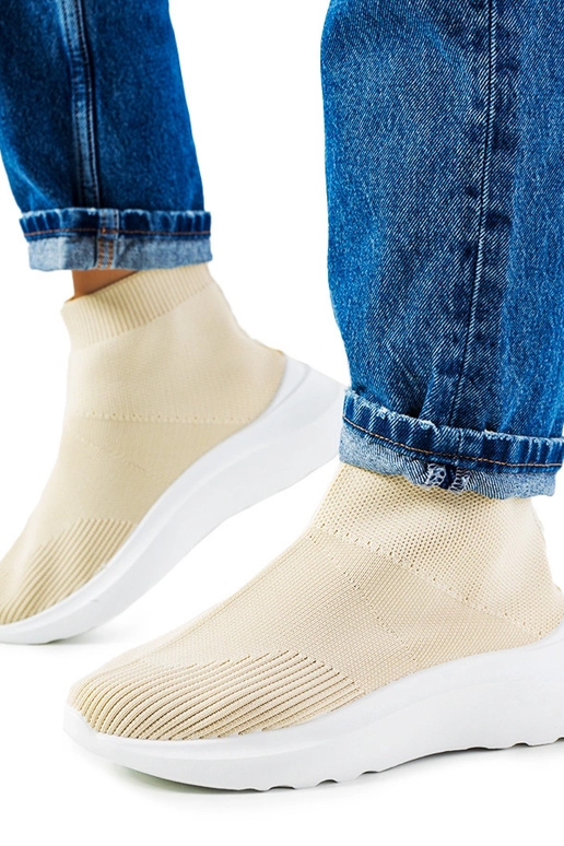 Les baskets montantes beiges de Jennifer Les baskets montantes beiges de Jennifer