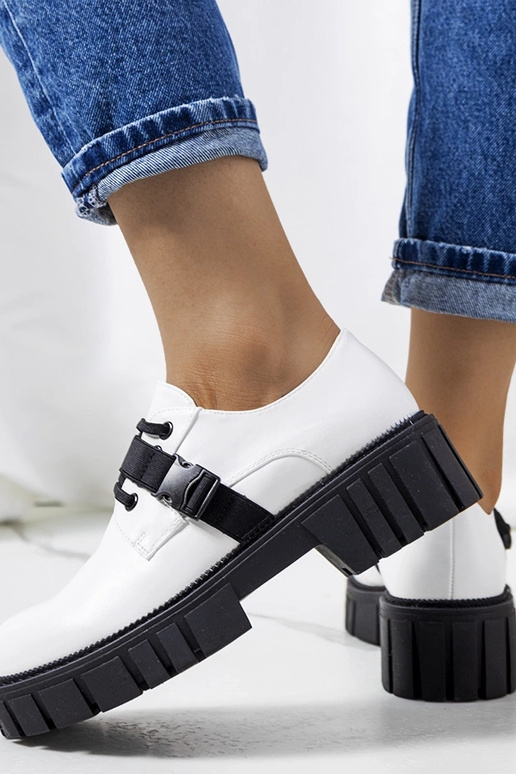 Chaussures blanches à semelles de...