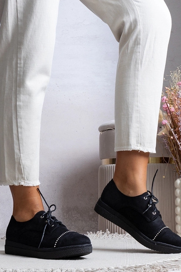 Demi-bottes noires pour...