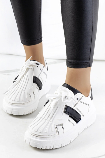 Witte sportschoenen met...