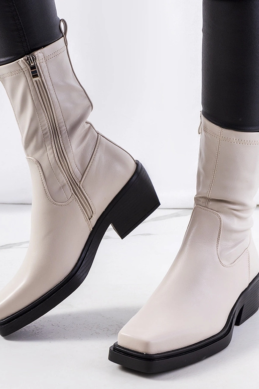 Beige Stiefeletten mit hohem Absatz... Beige Stiefeletten mit hohem Absatz...