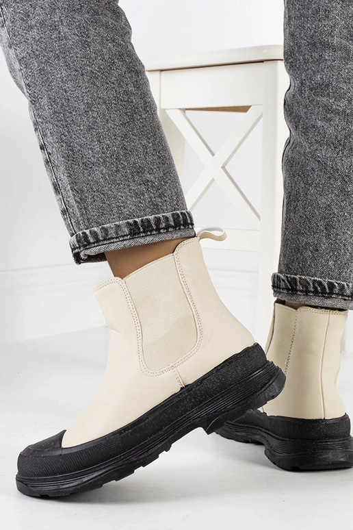 Bottes en simili cuir couleur sable...