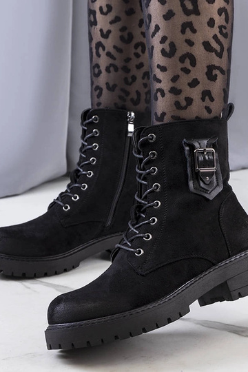 Les bottes noires de Judy
