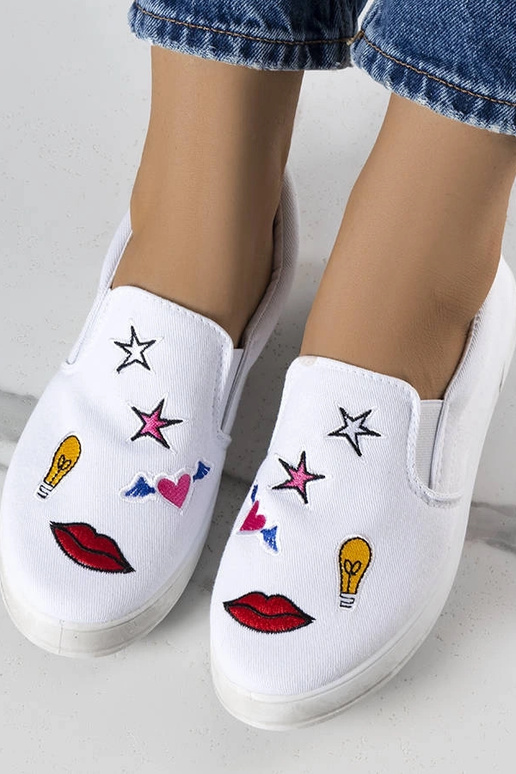 Weiße Stoff-Sneaker mit Anais-Patches Weiße Stoff-Sneaker mit Anais-Patches