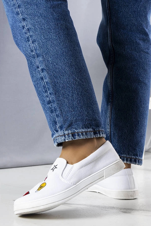 Weiße Stoff-Sneaker mit Anais-Patches Weiße Stoff-Sneaker mit Anais-Patches