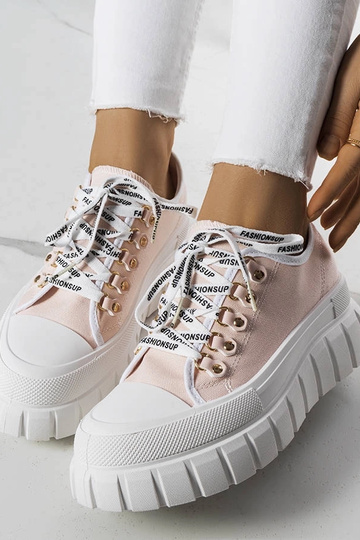 Roze schoenen op een... 2