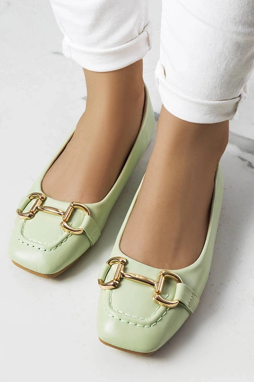 Grüne Schuhe mit goldenen Details,...