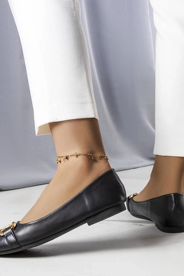 Schwarze Ballerinas mit goldener Iris-Verzierung