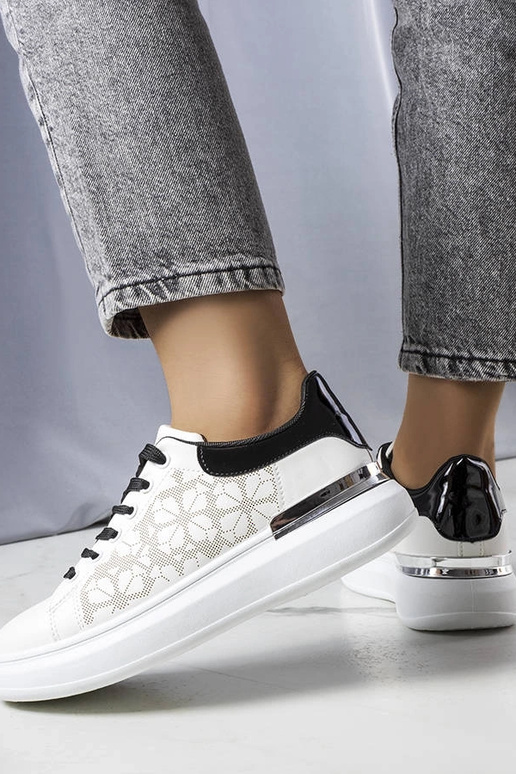 Schwarze und weiße perforierte... Schwarze und weiße perforierte...