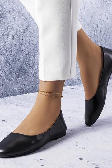 Schwarze Ballerinas mit...