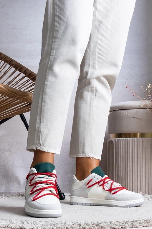 Graue Damen-Sneaker mit roten... Graue Damen-Sneaker mit roten...