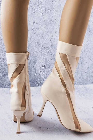 Sandfarbene Stiefel mit... 2