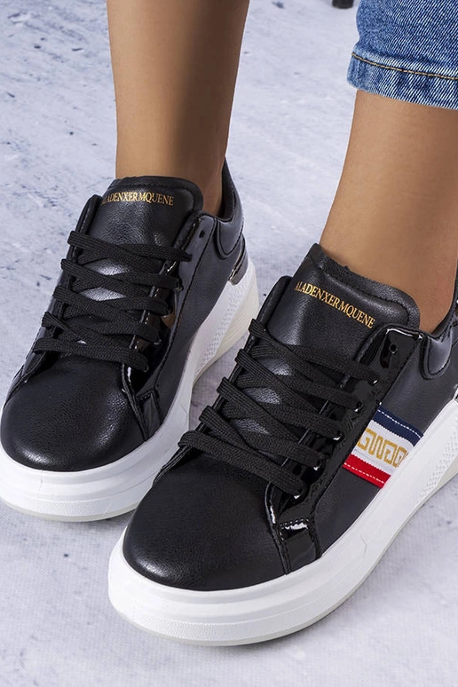 Chaussures noires avec empiècements...