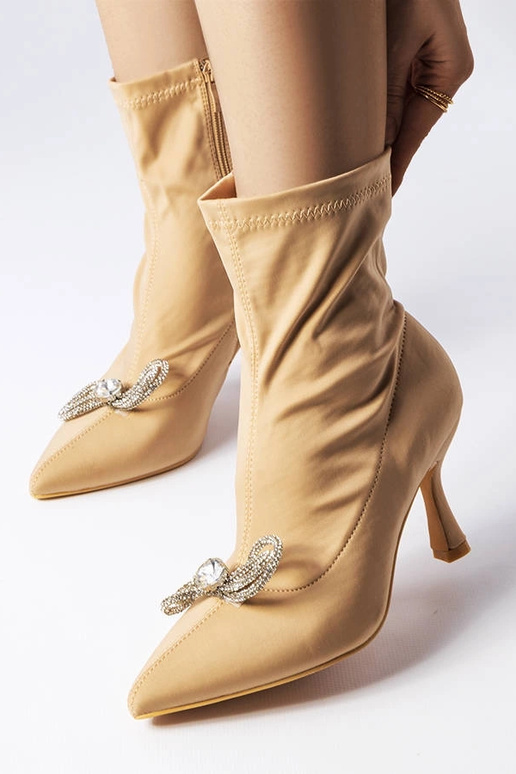 Bottines beiges ornées d'un noeud en...