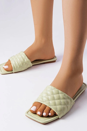 Grüne elegante gesteppte...