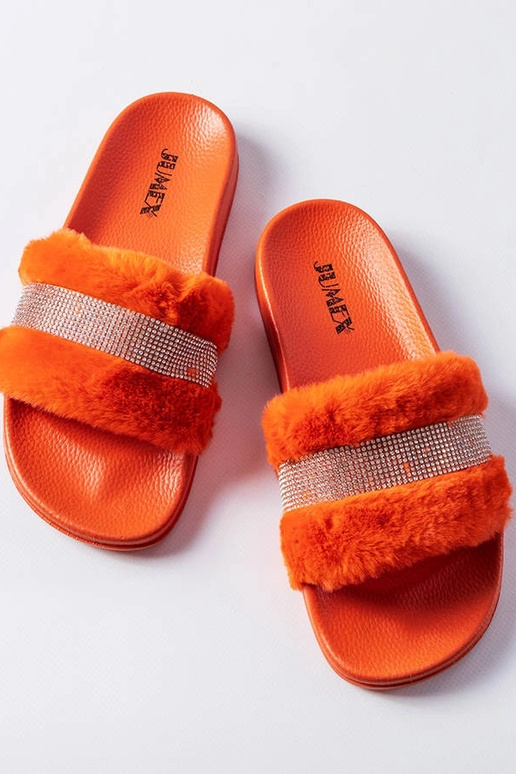 Orangefarbene Pantoletten mit...