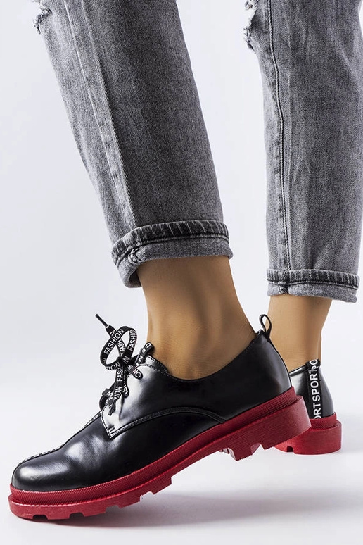 Schwarze Stiefeletten mit... Schwarze Stiefeletten mit...