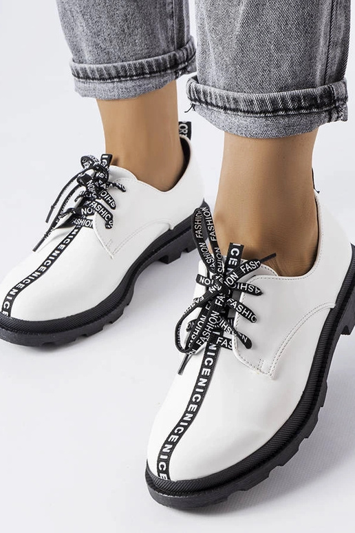 Weiße Stiefeletten mit... Weiße Stiefeletten mit...