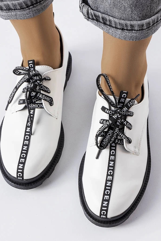 Weiße Stiefeletten mit... Weiße Stiefeletten mit...