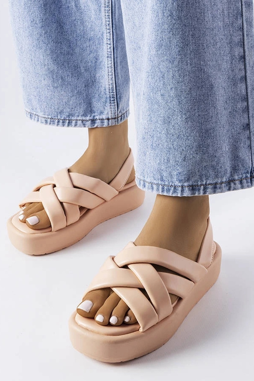 Rosa Plateausandalen mit Hufeisendesign