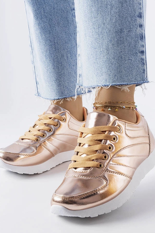 Goldene Turnschuhe von Quessy