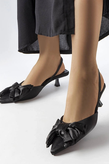 Talons noirs avec nœud, «...