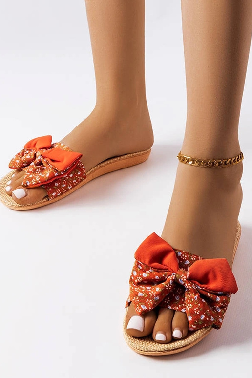 Rote Flip-Flops mit Schleife Tachel