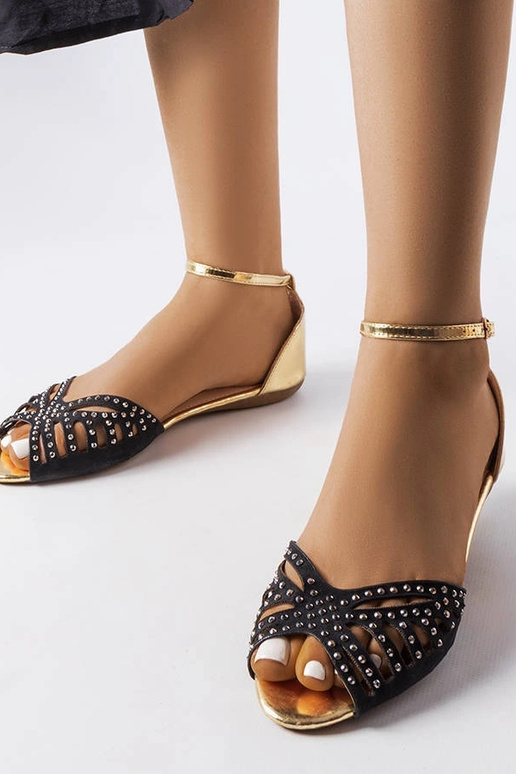 Schwarze durchbrochene Sandalen mit...