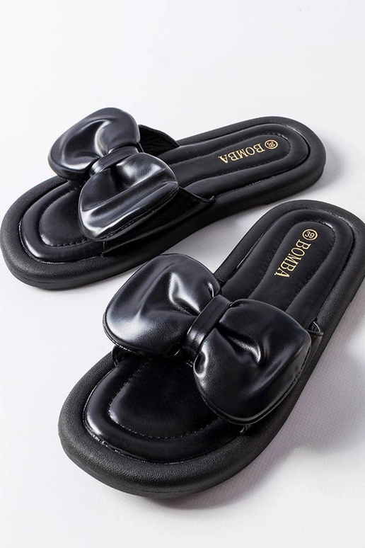 Schwarze Pantoletten mit Schleife...