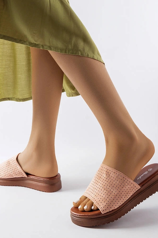 Rosa Flip-Flops mit durchbrochenem... Rosa Flip-Flops mit durchbrochenem...