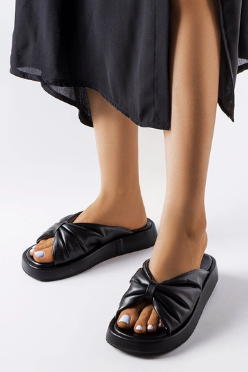 Schwarze Flip-Flops mit...