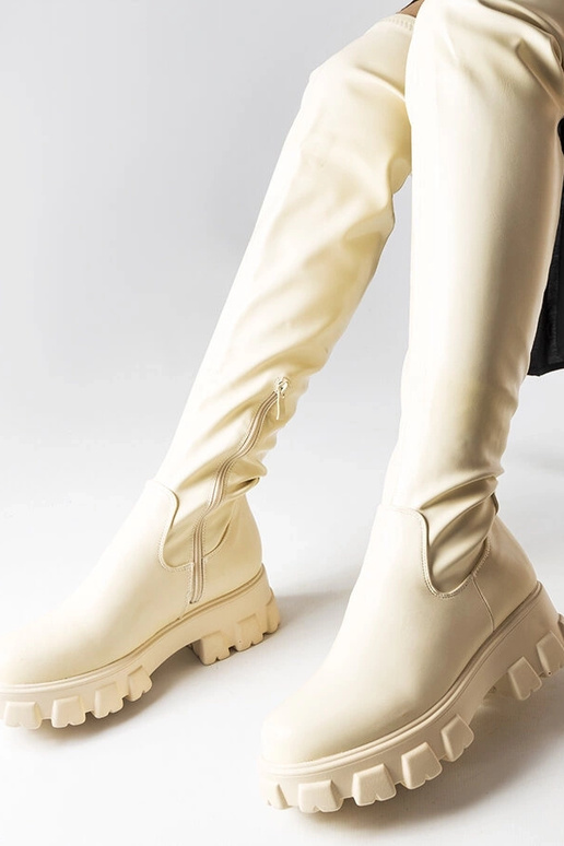 Sandfarbene kniehohe Stiefel aus... Sandfarbene kniehohe Stiefel aus...