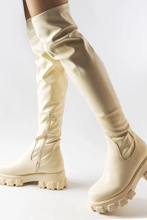 Sandfarbene kniehohe Stiefel aus... Sandfarbene kniehohe Stiefel aus...
