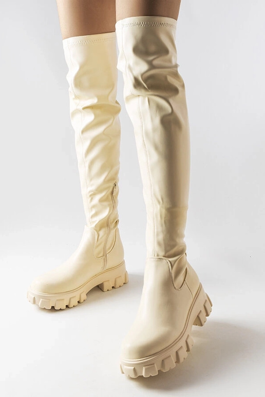 Sandfarbene kniehohe Stiefel aus... Sandfarbene kniehohe Stiefel aus...