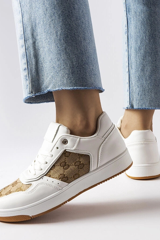 Weiße Sneakers verziert mit Isidoras...