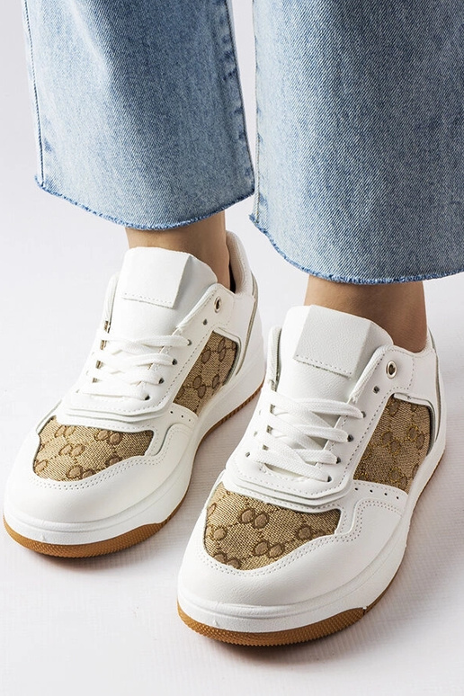 Weiße Sneakers verziert mit Isidoras...