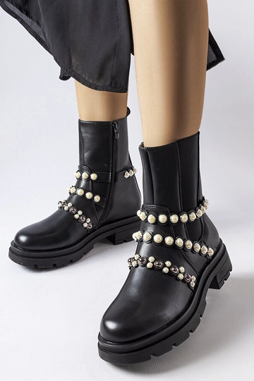 Bottines noires ornées de...