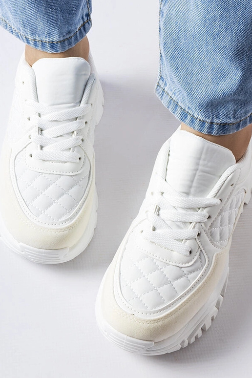 Weiße Sportschuhe mit silbernem... Weiße Sportschuhe mit silbernem...