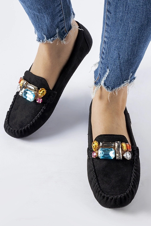 Schwarze Loafer mit dekorativem... Schwarze Loafer mit dekorativem...