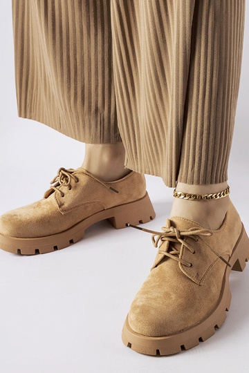 Mocassins bruns sur semelle...